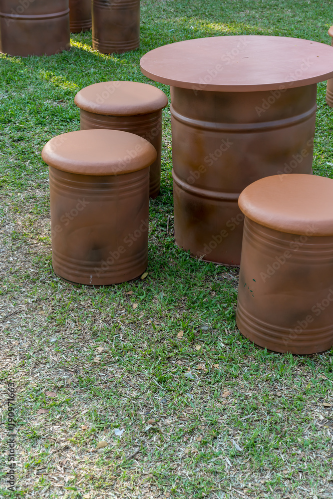 Naklejka premium Brown barrels bottom up for tables and chairs. Outdoor furniture