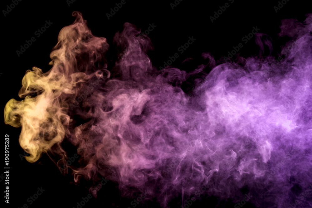 Thick colorful smoke of  lilic, orange and pink on a black isolated background. Background from the smoke of vape