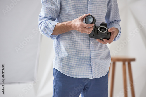 Photographer checking lens photo