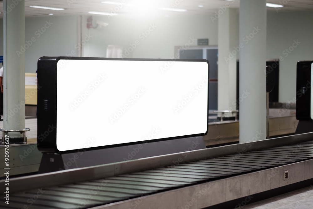 Fototapeta premium blank advertising billboard at airport,Mock up Poster media template Ads display in Subway station escalator