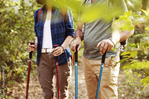 Couple trekking together photo