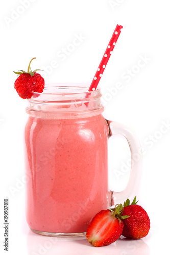 Glass of strawberry yogurt or smoothie isolated on white background © kolesnikovserg