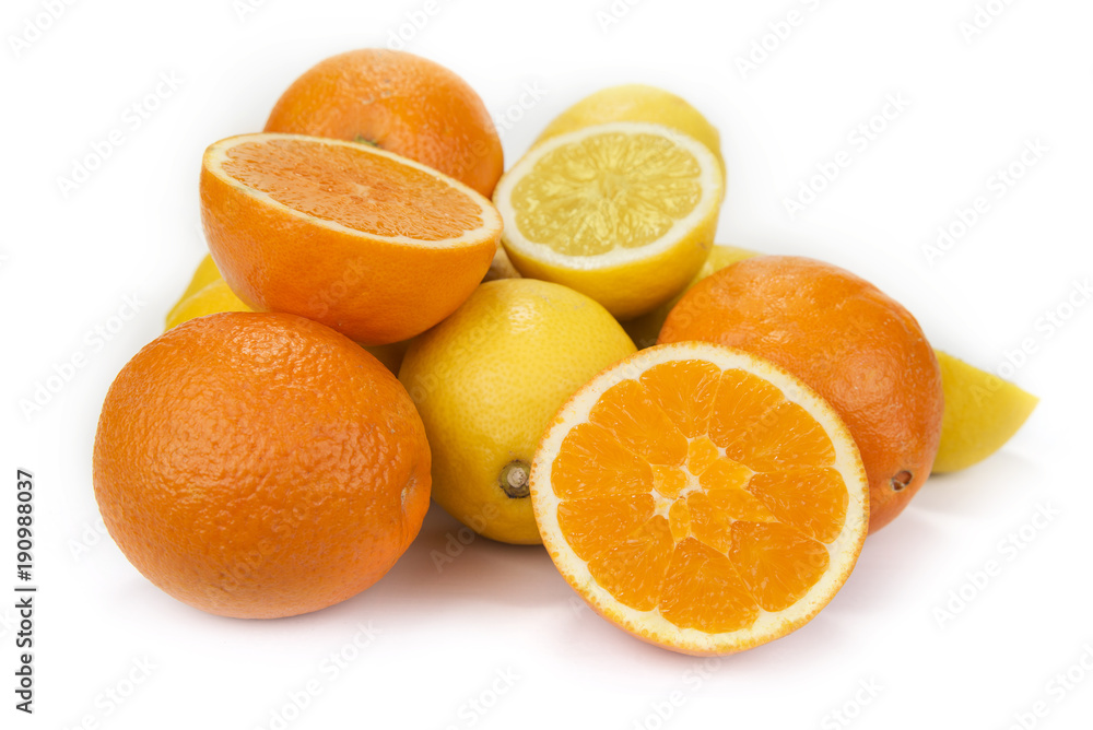 Fresh oranges and lemons on the white background Fresh oranges and lemons on the white background