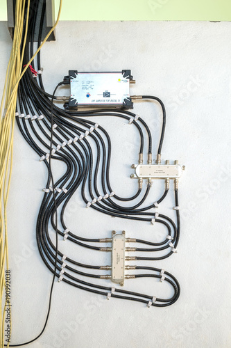 Cable Television System by Wire with Cable Signal Splitter in Apartment. photo