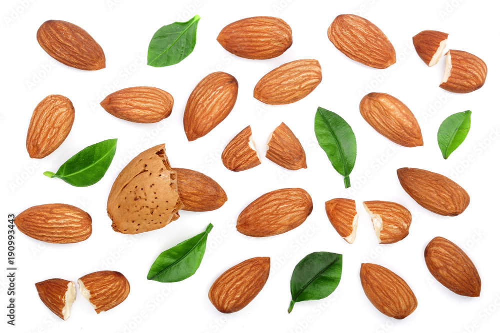 almonds with leaves isolated on white background. Top view. Flat lay pattern almonds with leaves isolated on white background. Top view. Flat lay pattern