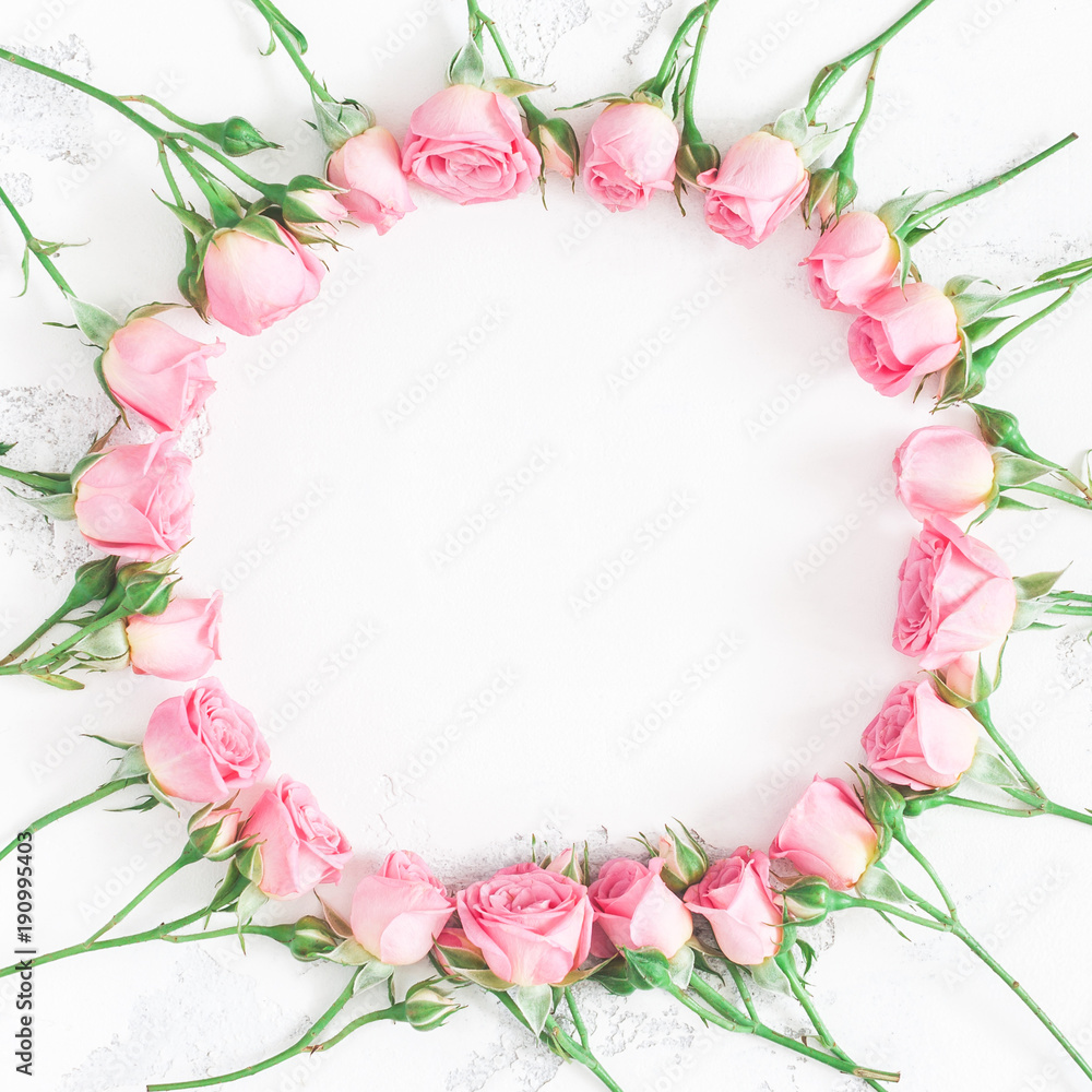 Flowers composition. Wreath made of pink rose flowers on white background. Flat lay, top view, copy space, square Flowers composition. Wreath made of pink rose flowers on white background. Flat lay, top view, copy space, square
