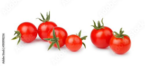 Cherry tomatoes with stem isolated on white background.