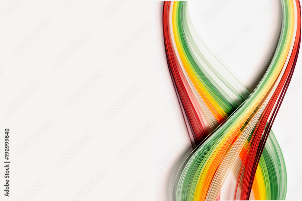 Fototapeta premium Colorful paper stripes on white background; abstract lines background