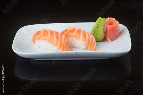 japanese cuisine. sushi salmon on the background