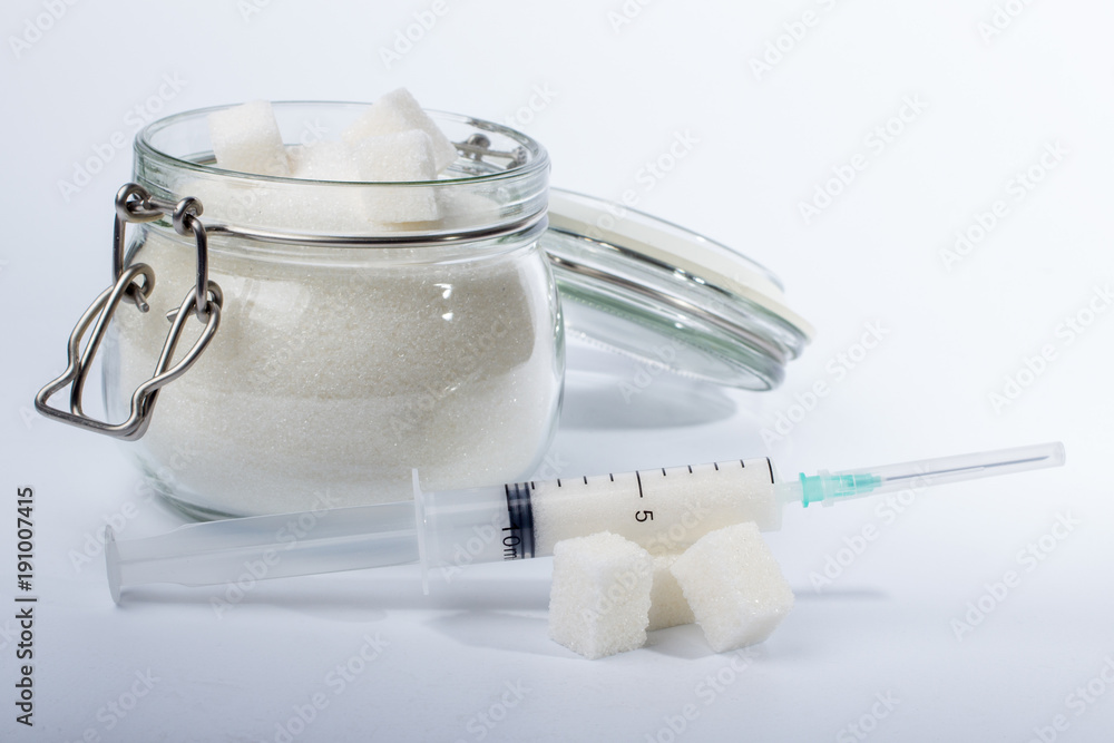 a syringe with sugar a syringe with sugar