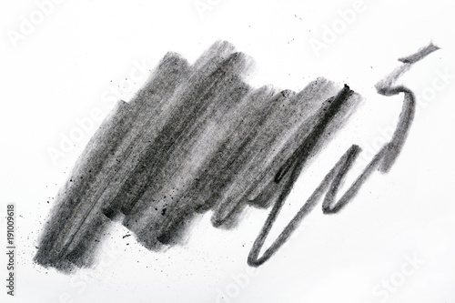 Charcoal artwork equipment on a white paper
