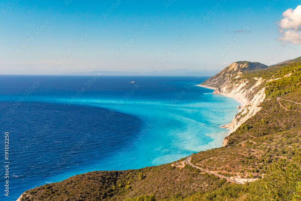 Lefkada Island cliffs and bay Porto Katsiki as seen from above aerial view with clear blue watter