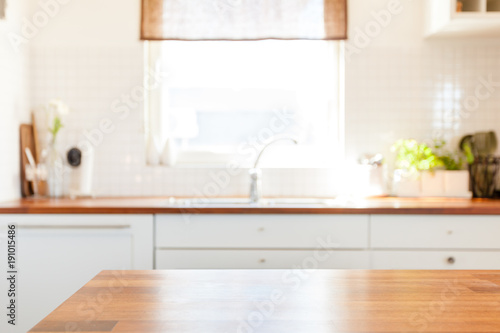 kitchen surface with interior in the background kitchen counter top in the foreground © annaia