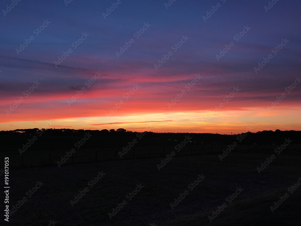 sunset in the countryside of rome sunset in the countryside of rome