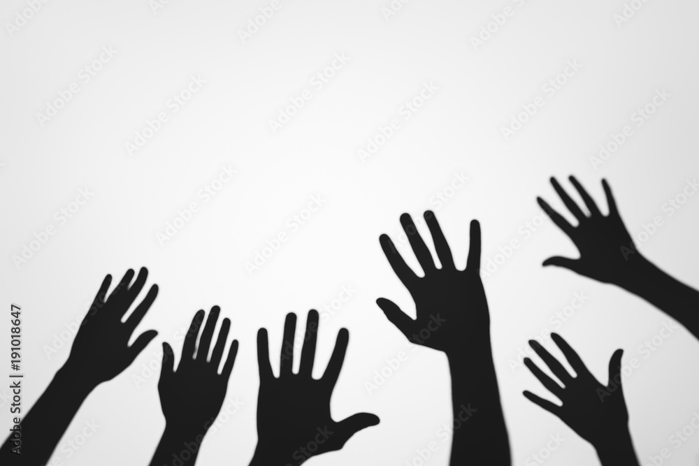 spooky mysterious shadows of human palms on grey spooky mysterious shadows of human palms on grey