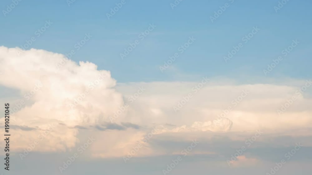 Russia, time lapse. Formation and rapid movement of white clouds of different shapes in the blue sky in late spring at sunset. Russia, time lapse. Formation and rapid movement of white clouds of different shapes in the blue sky in late spring at sunset.