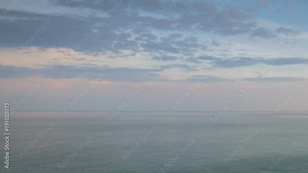 Russia, time lapse. Formation and rapid movement of white clouds of different shapes in the blue sky in late spring at sunset. Russia, time lapse. Formation and rapid movement of white clouds of different shapes in the blue sky in late spring at sunset.