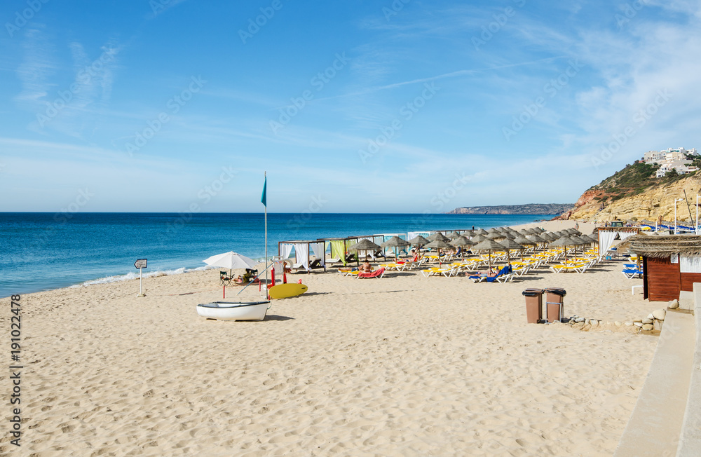Beautiful beach of Salema - small authentic fishing village at the county of Vila do Bispo, Algarve, Southern Portugal.