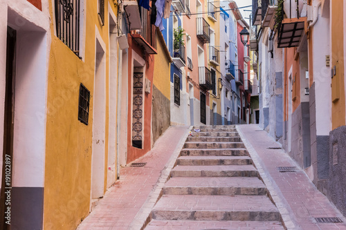 Colorful street in the historic center of Villajoyosa © venemama
