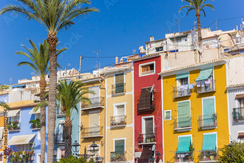 Colorful houses and palm trees in Villajoyosa