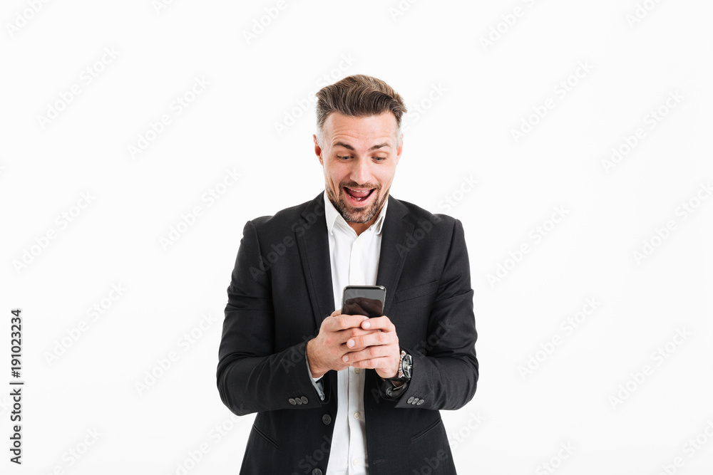 Portrait of a cheerful businessman dressed in suit Portrait of a cheerful businessman dressed in suit