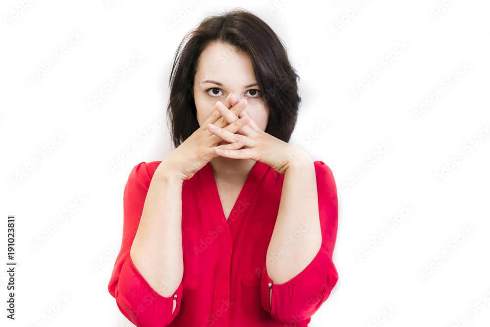 asian businesswoman thinking on white background. in a red dress, hands crossed in front of face. foxy girl asian businesswoman thinking on white background. in a red dress, hands crossed in front of face. foxy girl