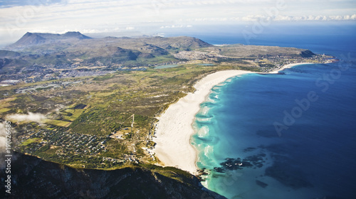 Noordhoek and Noordhoek Beach aerial in Cape Town, South Africa. In the distance is Kommetjie. photo