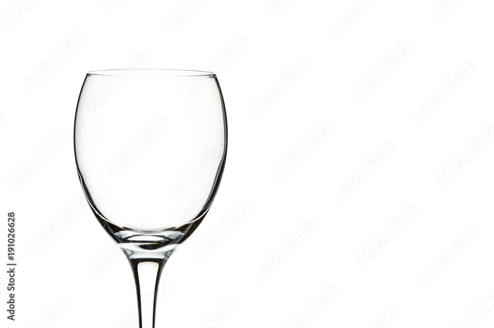 empty glass of wine close-up on a white background (isolate). empty glass of wine close-up on a white background (isolate).