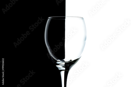 empty glass of wine on black and white backgrounds.