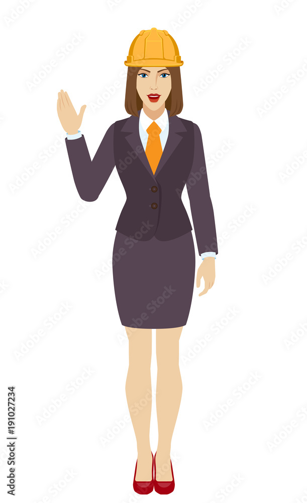 Businesswoman in construction helmet greeting someone with his hand raised up Businesswoman in construction helmet greeting someone with his hand raised up