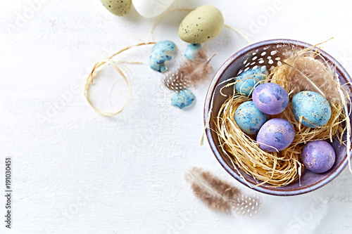 Speckled Easter Eggs in a Ceramic Bowl (flat lay arrangement)