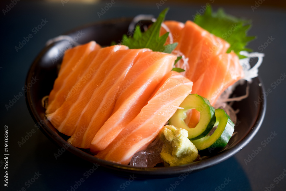 Closeup slice of salmon sashimi