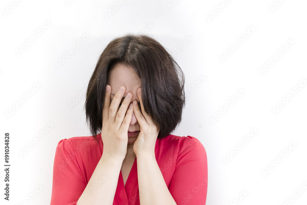 brunette girl is bored, dressed in red, isolated on white background brunette girl is bored, dressed in red, isolated on white background