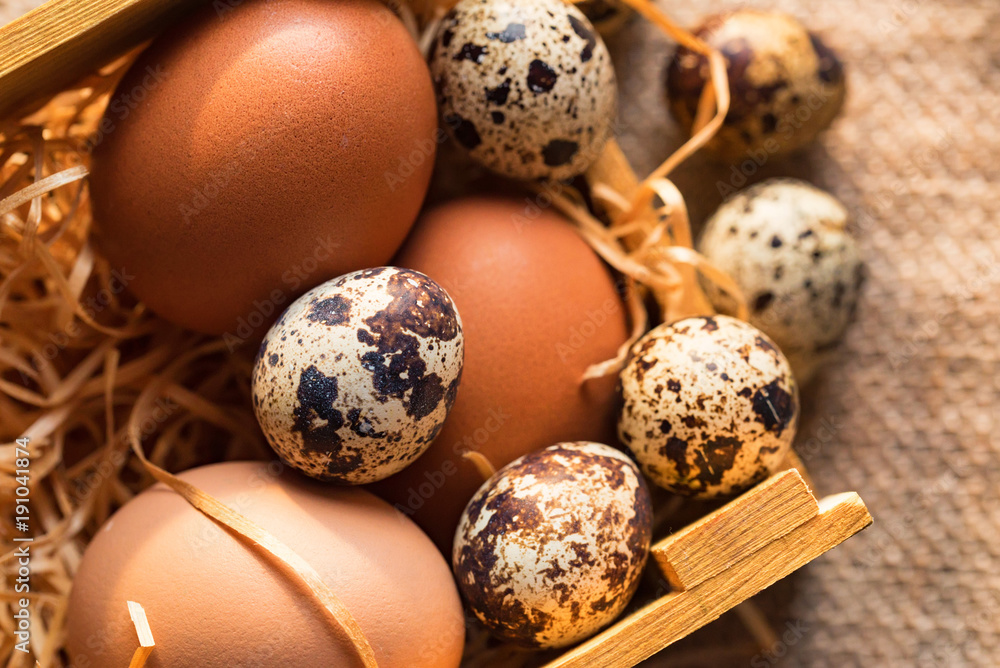 Fresh farm brown eggs on rustic background