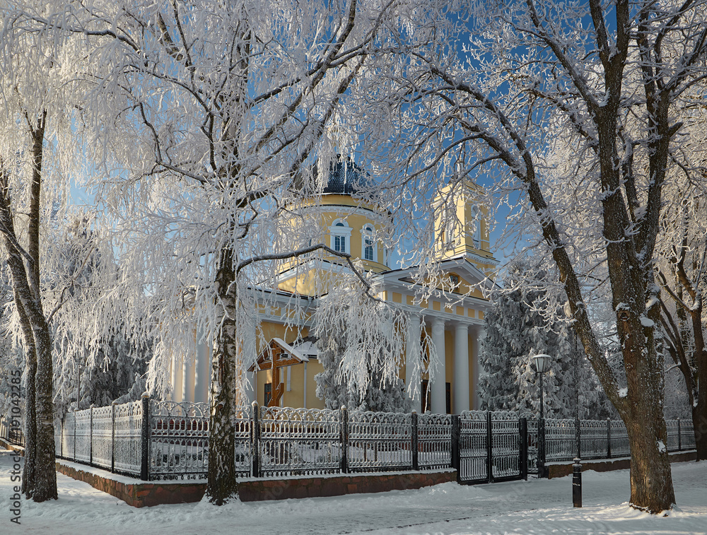 GOMEL, BELARUS - JANUARY 23, 2018: Peter and Paul Cathedral in the city park in icy frost. GOMEL, BELARUS - JANUARY 23, 2018: Peter and Paul Cathedral in the city park in icy frost.