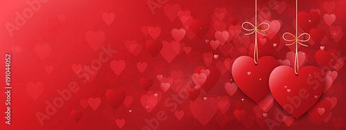 Hearts background with two heart pendants