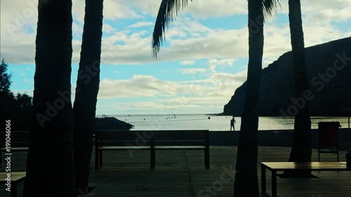 Time lapse of people talking on the beach.