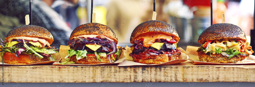 vegan burger in the street market - obrazy, fototapety, plakaty 