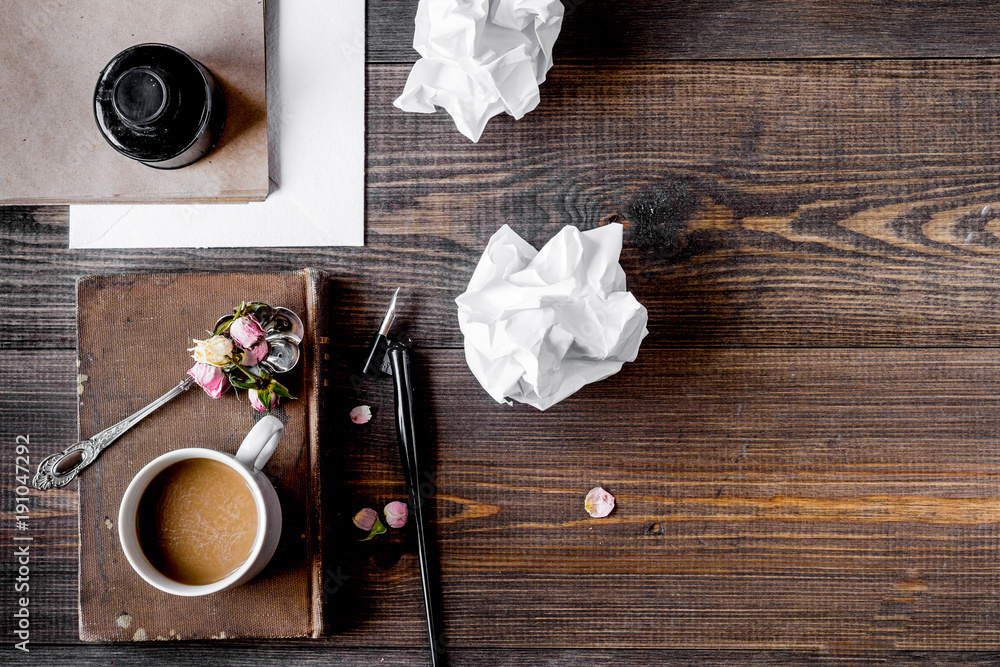 writer workplace with tools on wooden background top view mockup