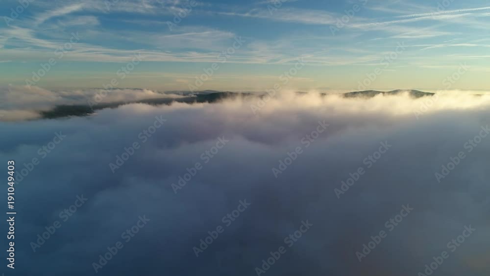 Drone flight above moving cloudscape Drone flight above moving cloudscape