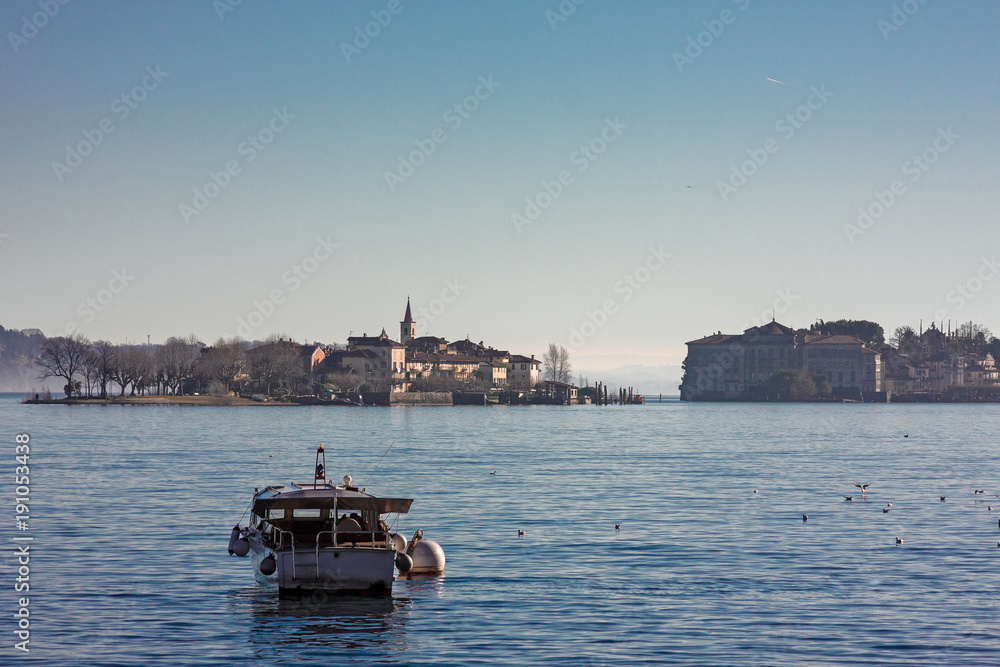 Fototapeta premium a motor boat is moored on the lake.