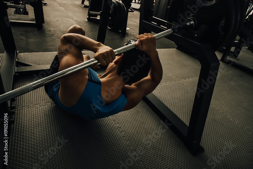 Gym workout accident or overtraining. Weight lifting accident. Accident on gym workout concept.