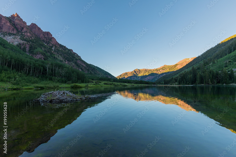 Scenic Reflection in a Colorado Wilderness Lake in Summer