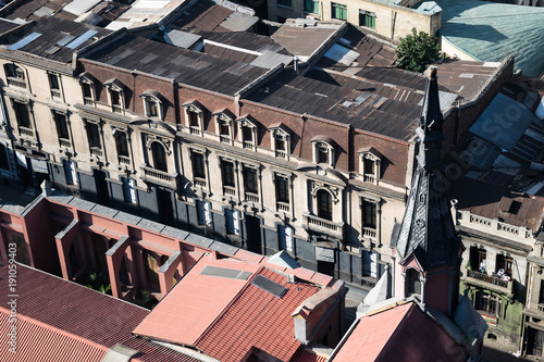 Old building with historical detail in facade, Santiago, Chile photo