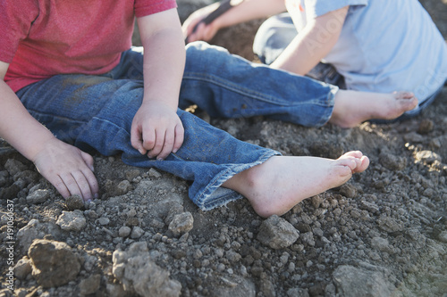 Boys Playing in Dirt