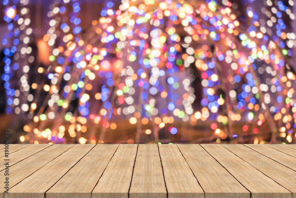 wood table top on colorful blurred background,space for montage product wood table top on colorful blurred background,space for montage product