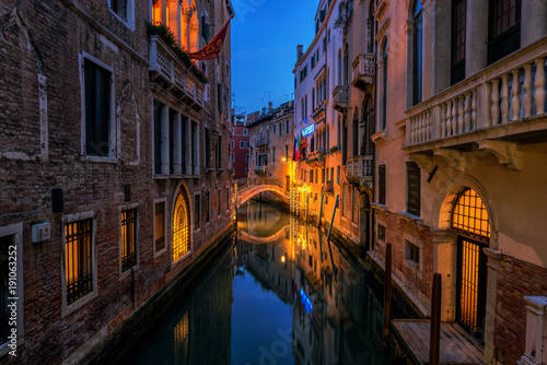 Landscape view of canal bridge and building in early morning with no people no tourist as beautiful amazing view and attraction in venice , Italy
