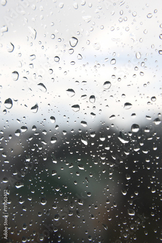 Drops of rain on the window, rainy day