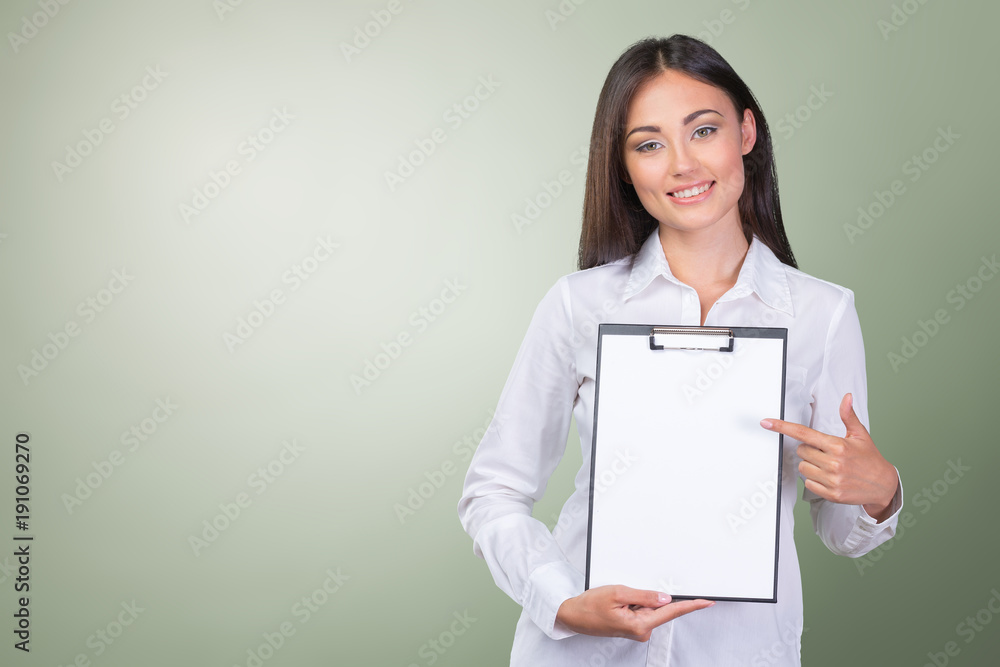 young business woman standing with her clipboard young business woman standing with her clipboard