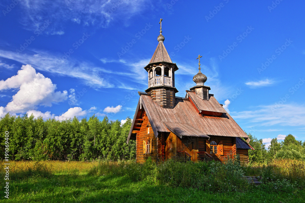 Wooden Church in a forest clearing Wooden Church in a forest clearing